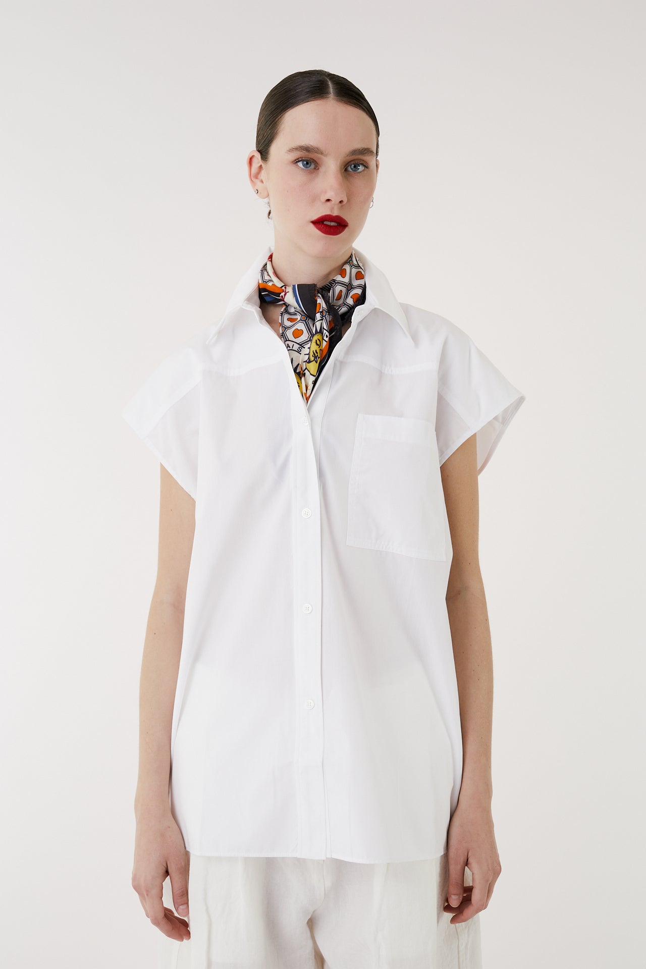 Kala white sleeveless top